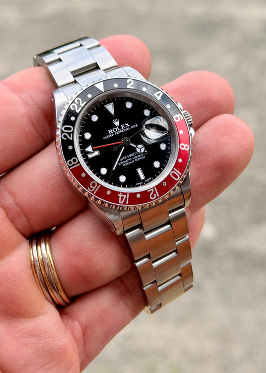 2001 Rolex GMT-Master II 16710 “Coke” – Full Set