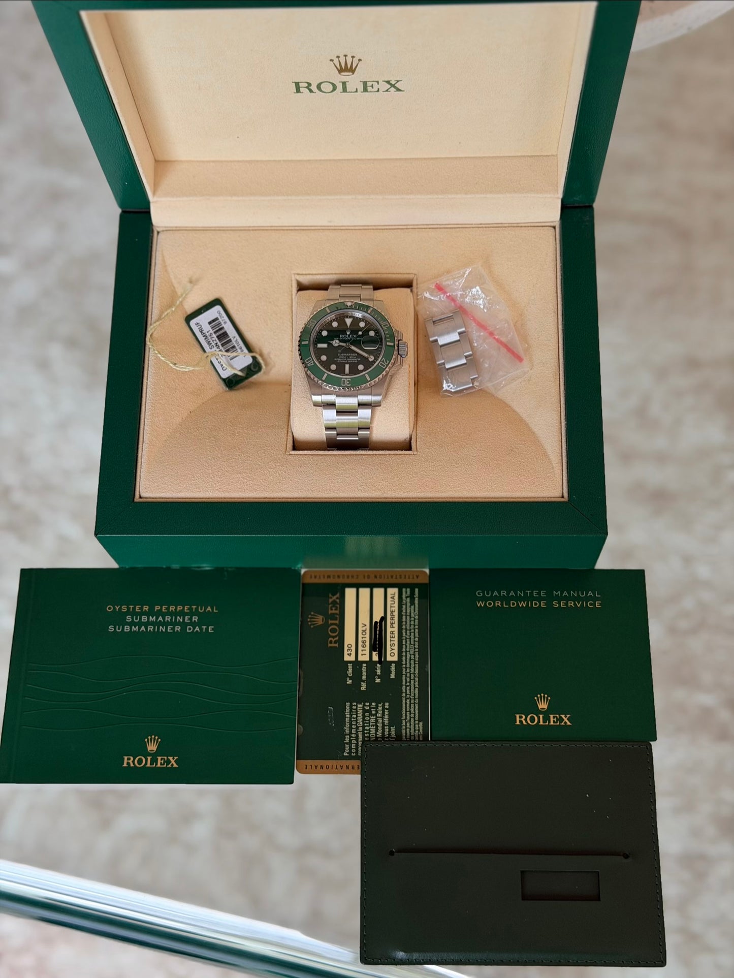 2012 Rolex Submariner 116610LV “Hulk” - Box and papers with white tag